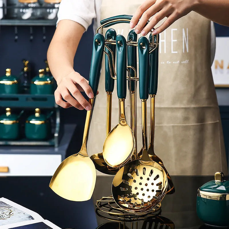 7-piece stainless steel kitchen utensil set including slotted spatula, turner, ladle, serving spoon, and pasta server