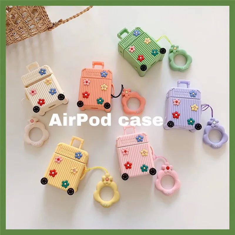 Pink silicone flip cover on an Apple AirPods 1st generation charging case.