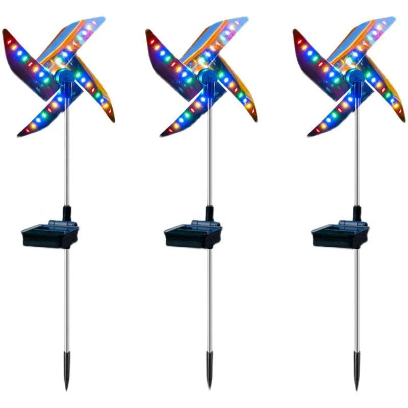 Solar wind spinner light with LED and IP65 rating, featuring spinning windmill decoration for garden paths in four colour options