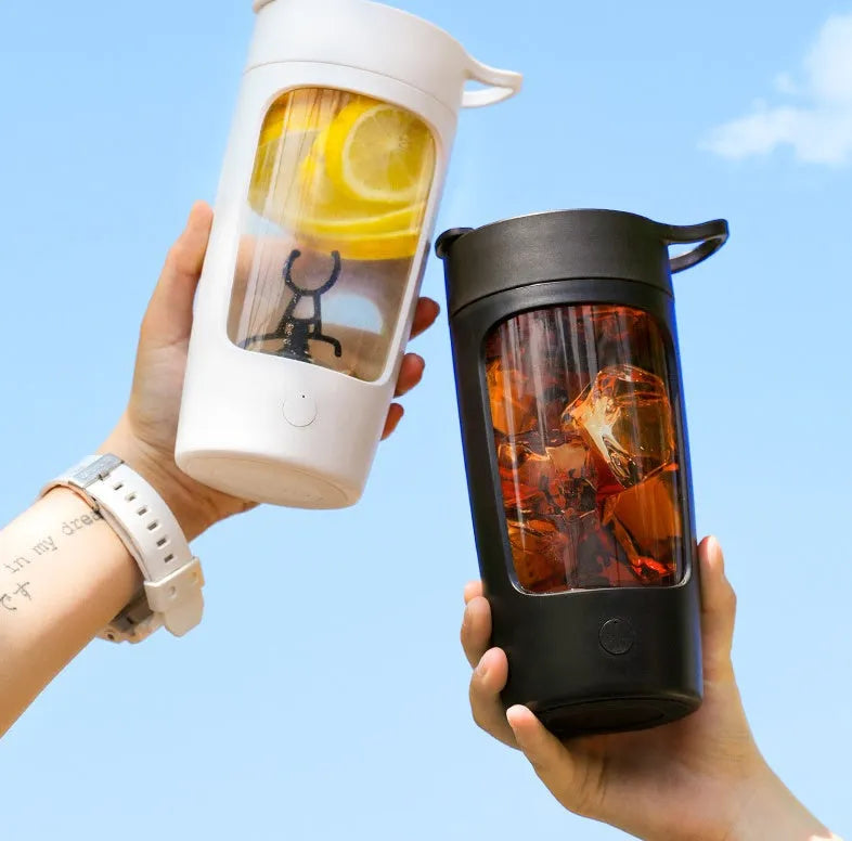 Portable rechargeable blender cup in blue, showing the 650ml capacity bottle and motorised lid.