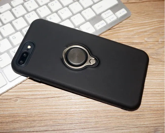 Black magnetic back cover case for Apple iPhone on a table