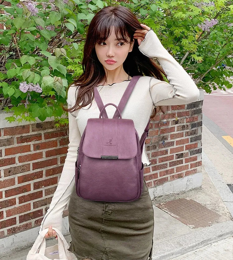 Fashion backpack in PU material with dimensions 30x24x12cm, shown in five colours including Black and Grey