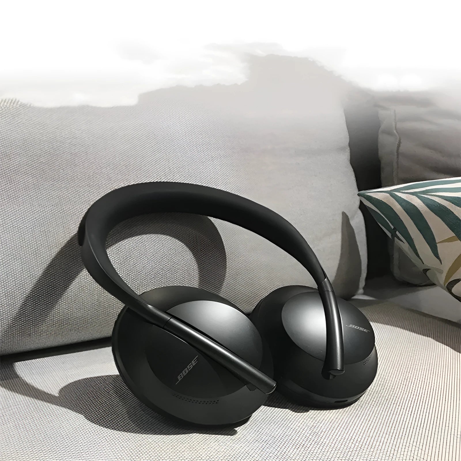 Wireless noise reduction bluetooth headset in Black with cushioned ear pads and adjustable headband
