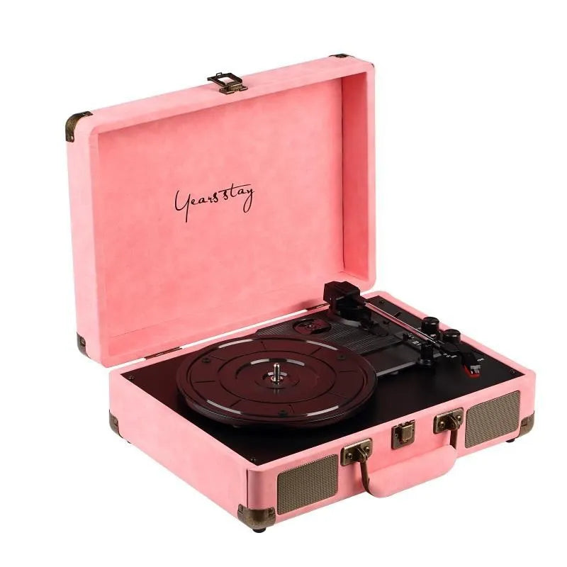 Portable Bluetooth phonograph turntable in a leather case, showing colour options.