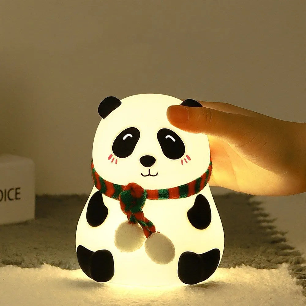 Panda-shaped silicone night light with USB charging port and compact design.