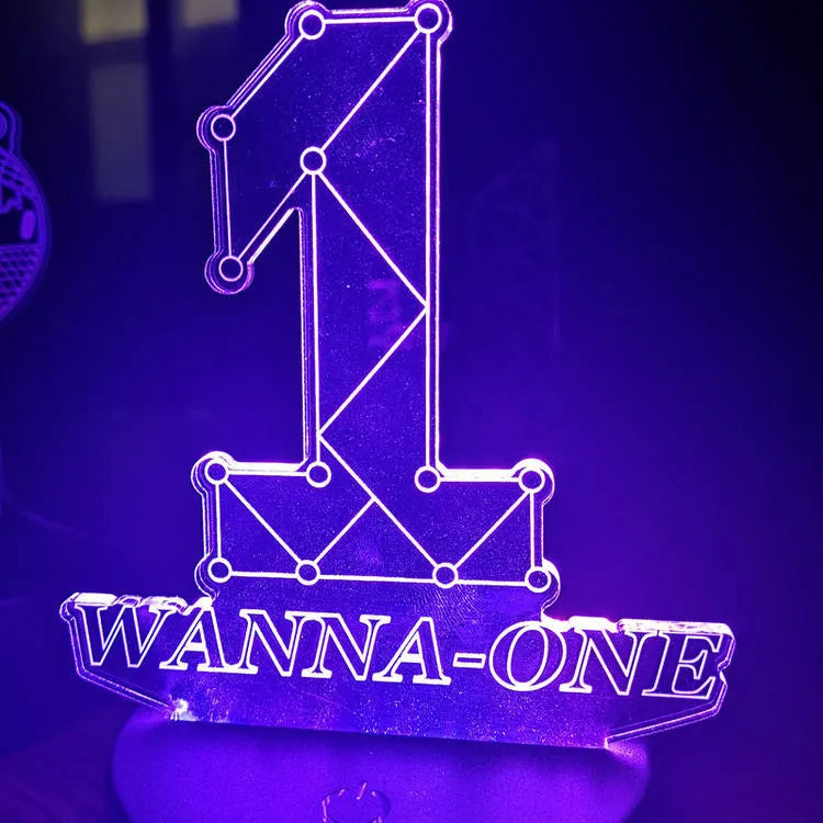 Clear acrylic stand for BTS Light 101 BTS Tower Gem album display on a table.
