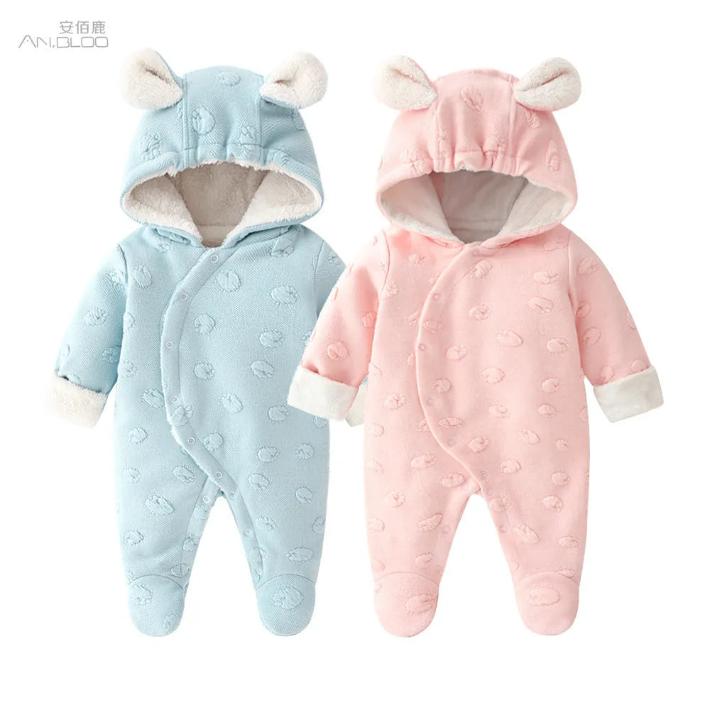 Baby wearing long sleeve princess romper with dark buckle closure in light blue colour