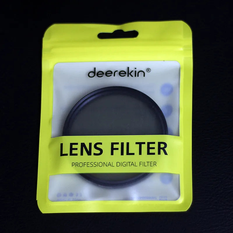 ND8 neutral density camera lens filter with silver aviation aluminium frame, shown next to a lens.