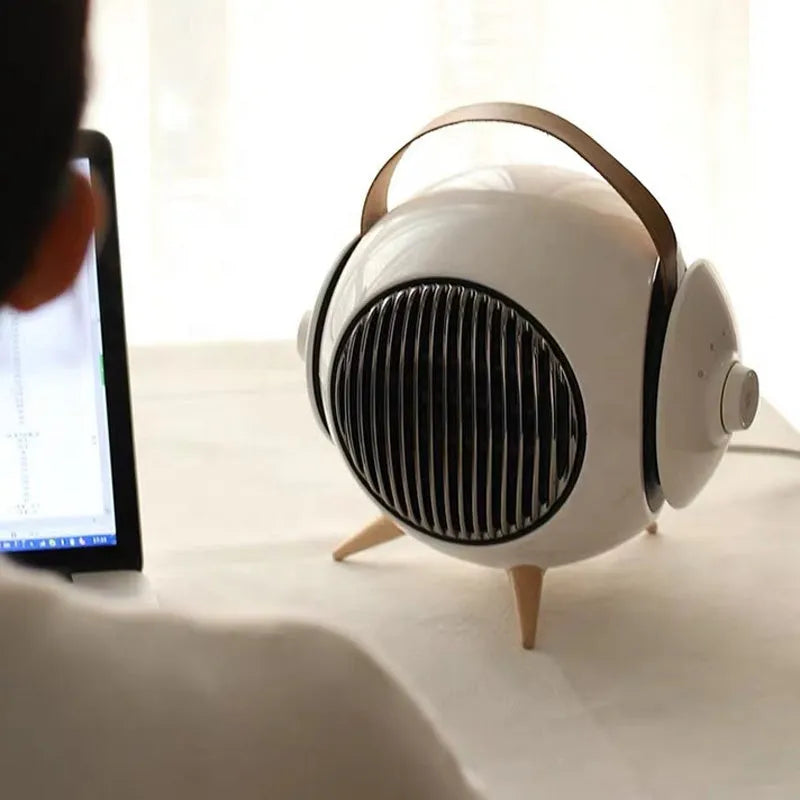 White household heater with forced air supply and shaking head on floor