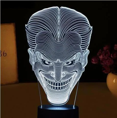 USB-powered 3D acrylic LED table lamp showing colourful gradient lighting on a desk.