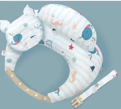 Multifunction nursing pillow with adjustable strap and white cotton cover for breastfeeding and baby support.