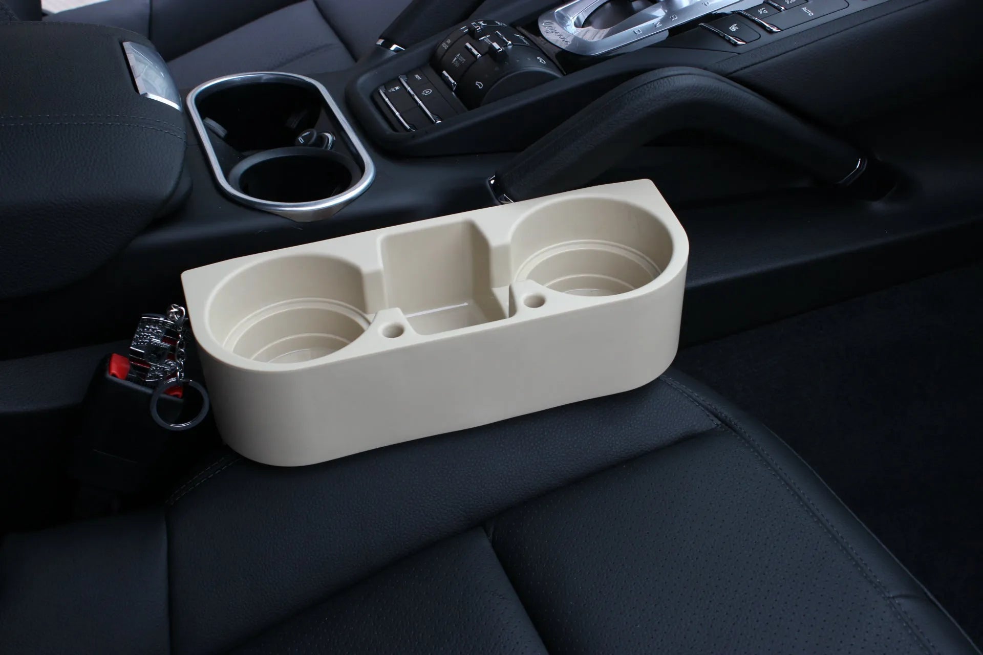PP plastic car cup holder with two cup seats and sundries compartment in black, 21x28x10cm, for seat back mounting