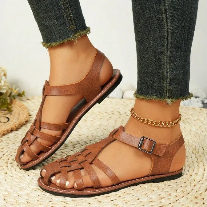 Dark brown women's vintage weave sandals with closed toe, roman buckle, and a soft rubber sole.