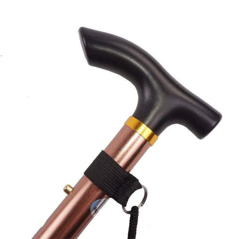 Aluminium alloy folding walking cane extended, showing adjustable sections and non-slip tip.