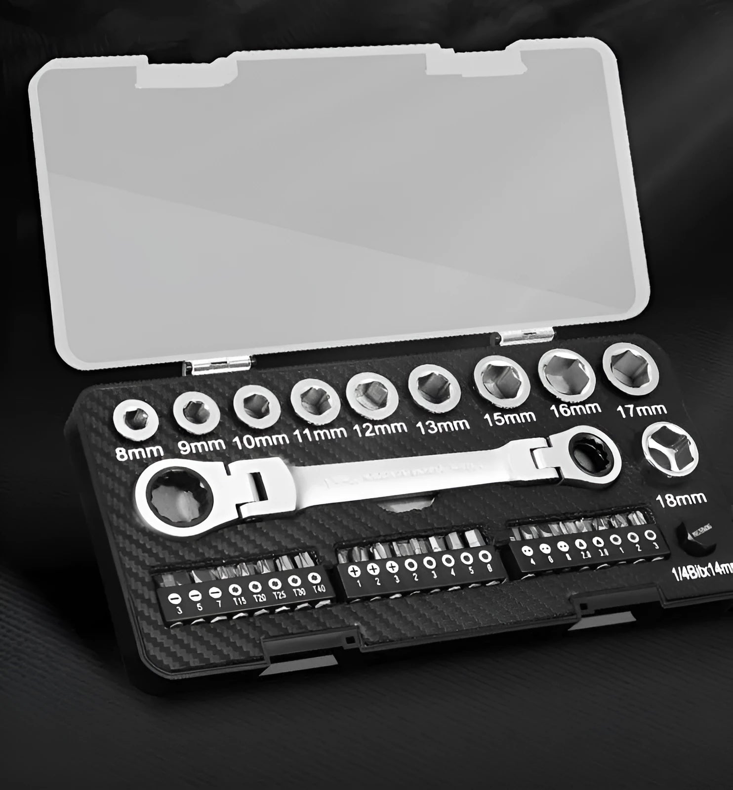 A two-way reversible ratchet wrench set with ten sockets and three screwdriver bits laid out on a surface.