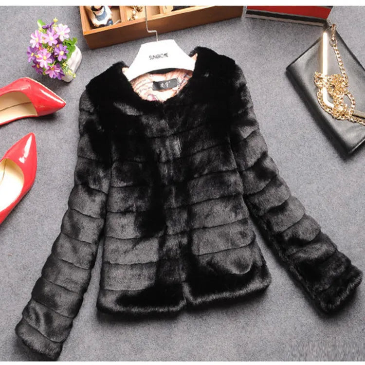 Women's short-length faux fur top in beige colour on a model, showcasing its textured fabric and regular sleeves.