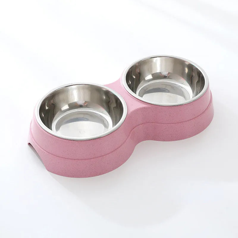 Double pet bowl set with two stainless steel bowls and blue straw holder on white background