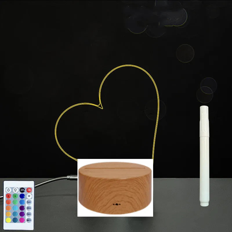 3D acrylic LED message board with touch control, black ABS base, USB cable, and stylus pen on desk