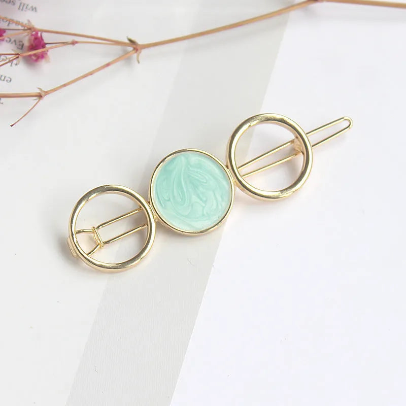 Round metal hairpin with opal crystal centre in beige colour, 7cm alloy construction