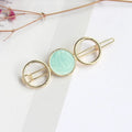 Round metal hairpin with opal crystal centre in beige colour, 7cm alloy construction