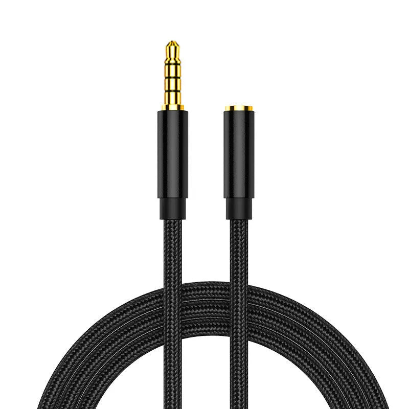 Black nylon braided 3.5mm aux extension cable coiled on a surface, 1.5 metre length