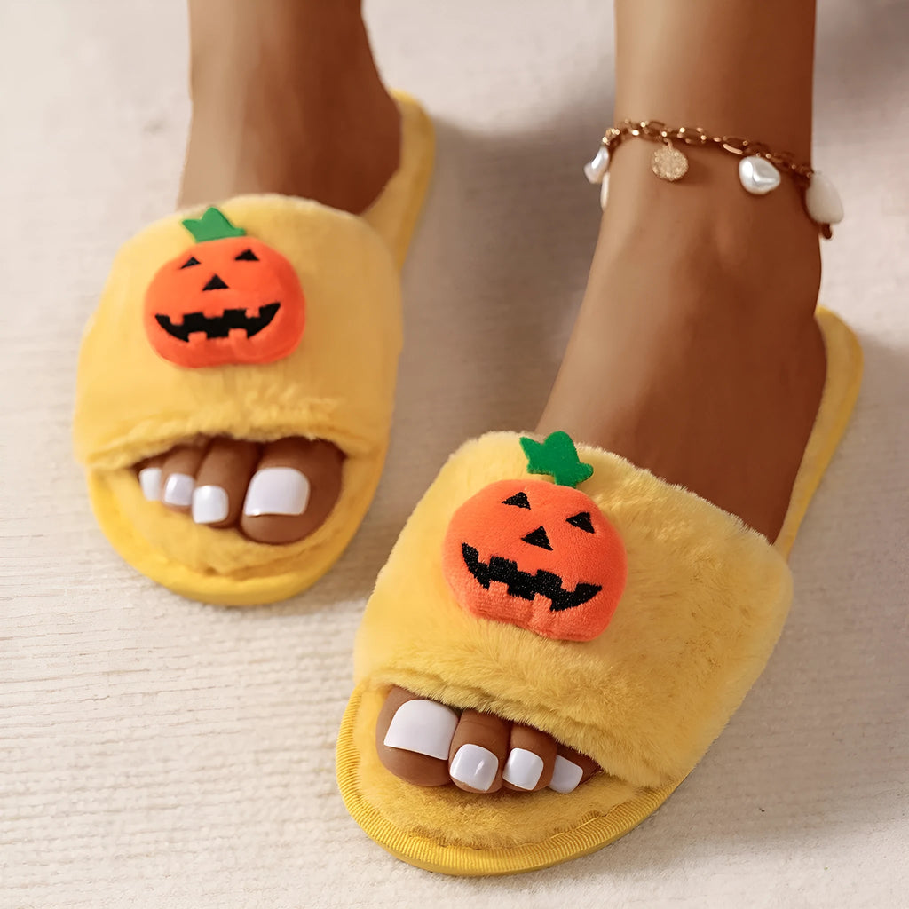White and yellow cartoon pumpkin plush open-toe slippers with a synthetic fur upper and PVC sole.