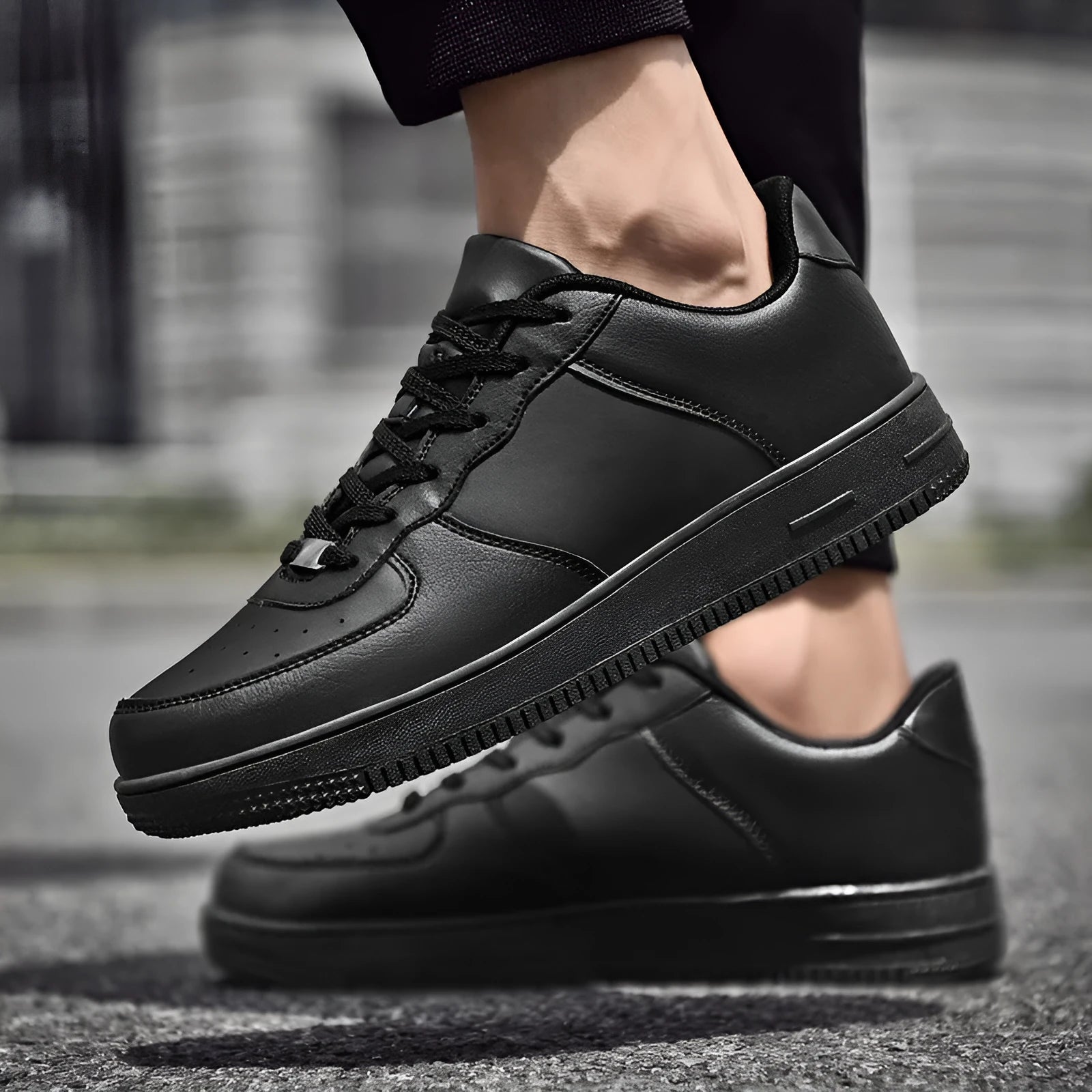 Pair of leather and nylon sneakers with rubber sole, available in black and white, sizes 35-46