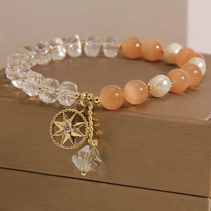 Gold-plated women's bracelet with orange crystal eight Awn star design