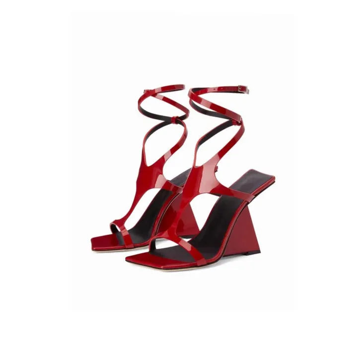 Women's black high heel sandals with a square toe, 9.5cm stiletto heel, and button ankle strap.