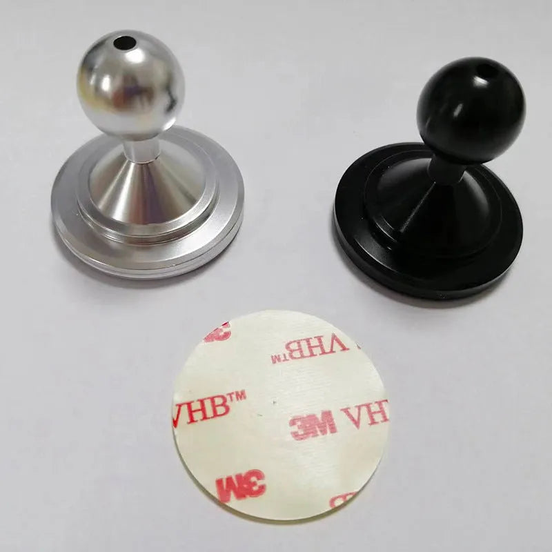 Silver and black aluminium alloy universal instrument panel mounting base plate.