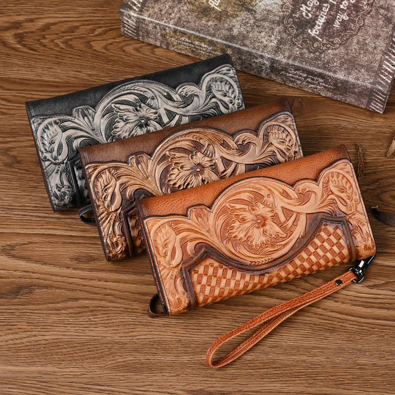 Retro brown women's tri-fold wallet with deep embossed floral pattern, shown open to reveal compartments.