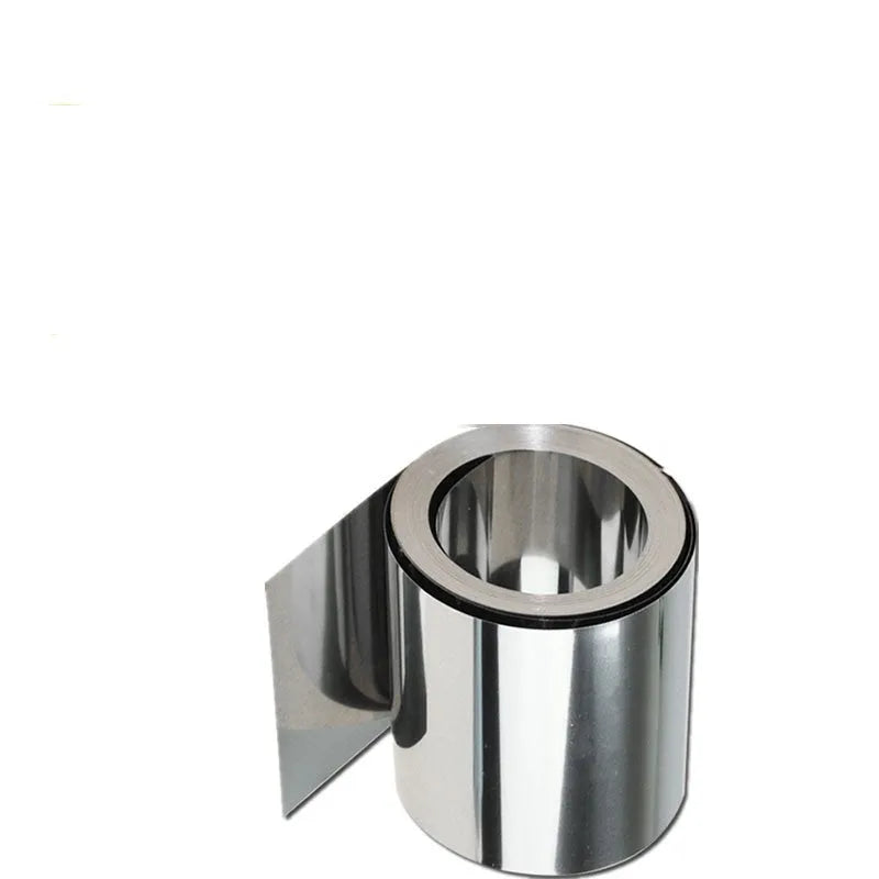 Close-up of a rolled 304 stainless steel metal strip with a leather item, showing its metallic finish and dimensions.