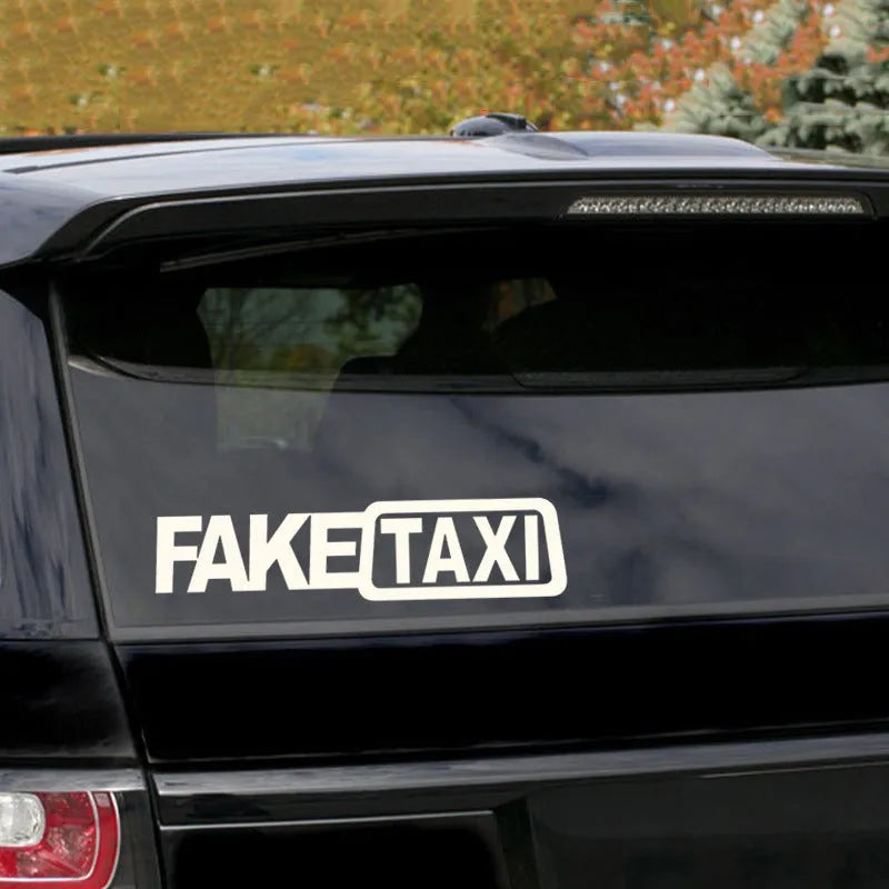 FAKE TAXI text car window sticker in yellow, 20cm by 8cm, made from waterproof PET material.