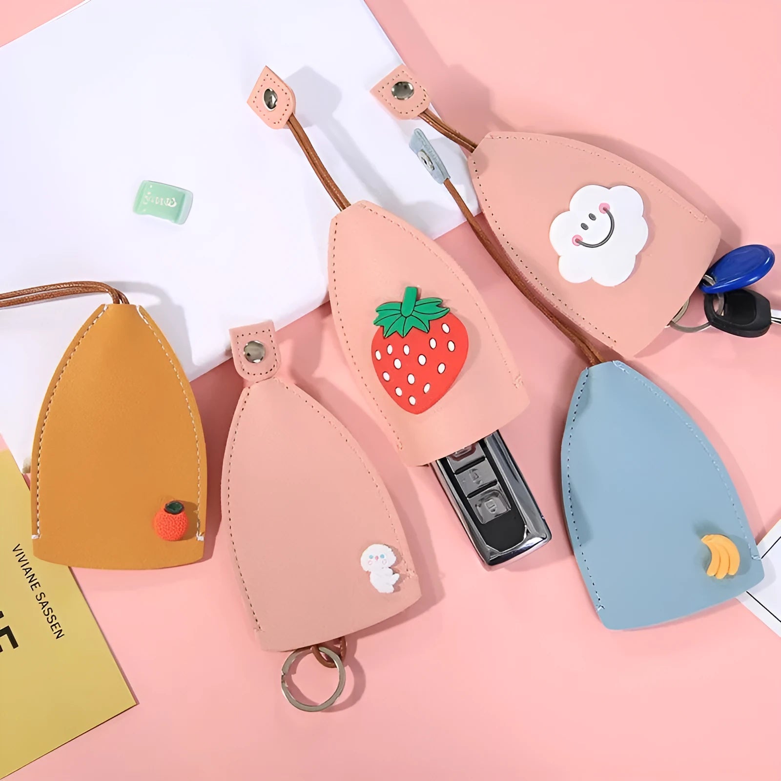 Colourful cartoon PU leather pull-out key case for car keys, shown open and closed