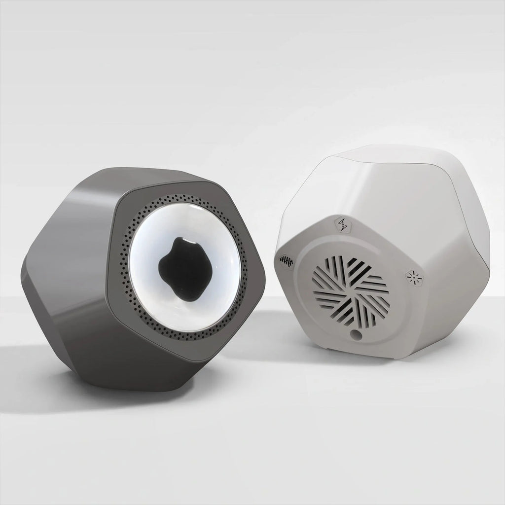 Floating magnetic fluid audio ornament Bluetooth speaker in black with magnetic patterns visible