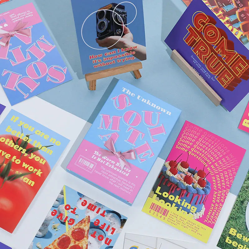 Two designs of fresh-style printed postcards showing artwork fronts and blank backs for messages.