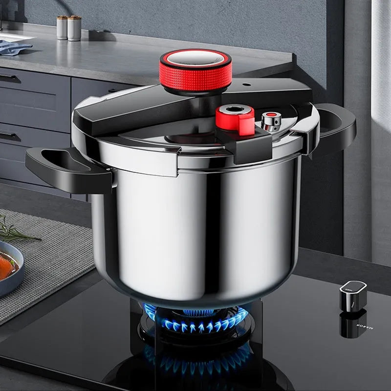 Stainless steel stovetop pressure cooker with a black handle and three-speed pressure lid on a kitchen counter.