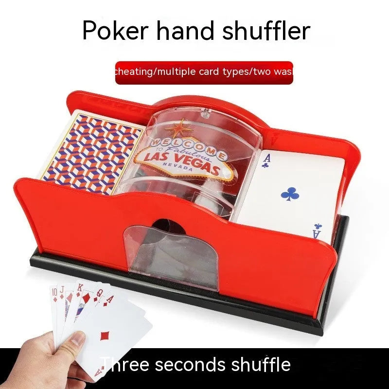 Black manual card shuffling machine with hand crank on wooden table
