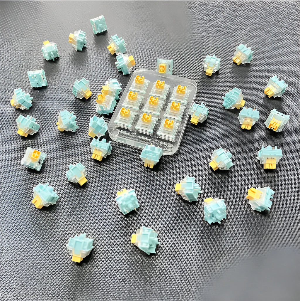 Set of 36 Sea Salt Lemon PRO Mute coloured five-pin mechanical keyboard switches.