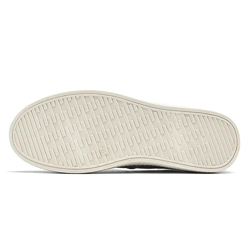 Men's beige linen cloth slip-on shoes with a round toe and shallow mouth on a grey background.