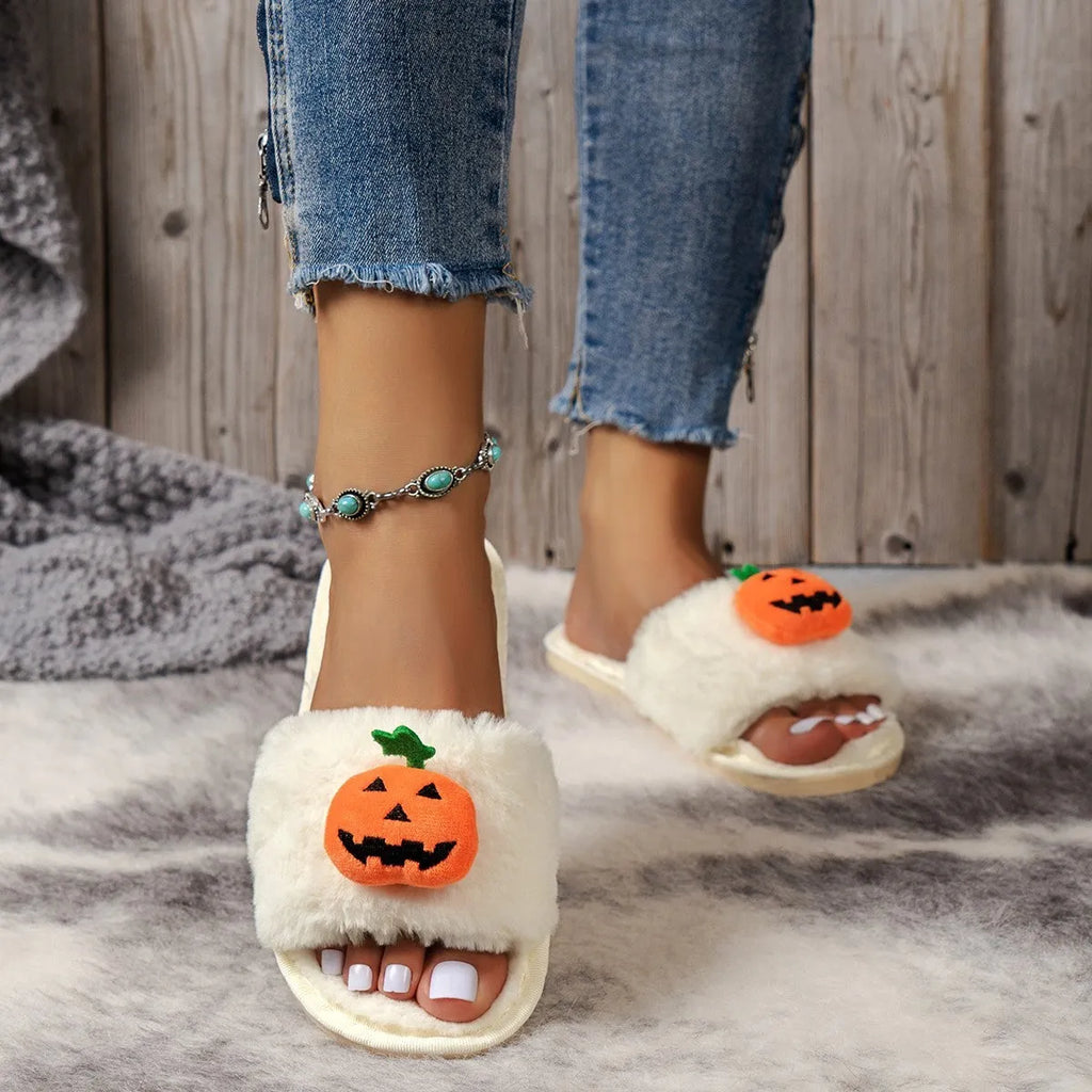 White and yellow cartoon pumpkin plush open-toe slippers with a synthetic fur upper and PVC sole.