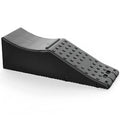 Black rectangular car boot protection pad with raised edges, shown isolated.