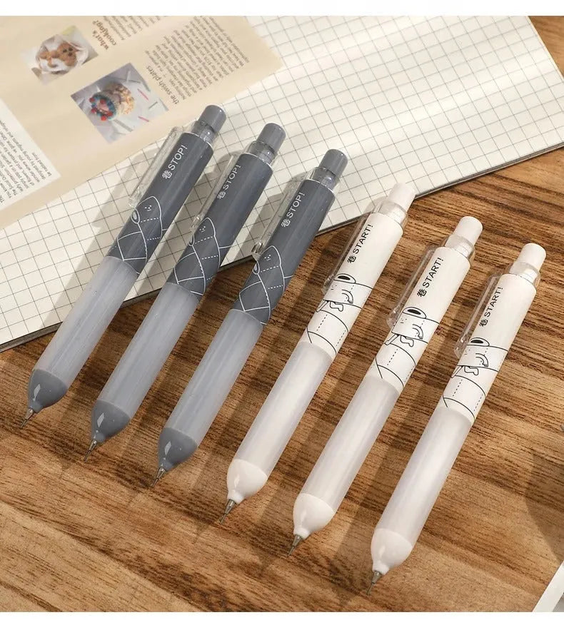 Black and white 0.5mm mechanical pencils showing cloud grip detail on the plastic barrel.