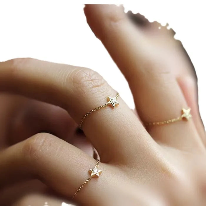18K yellow gold adjustable star ring with two diamonds on hand, women's light luxury design