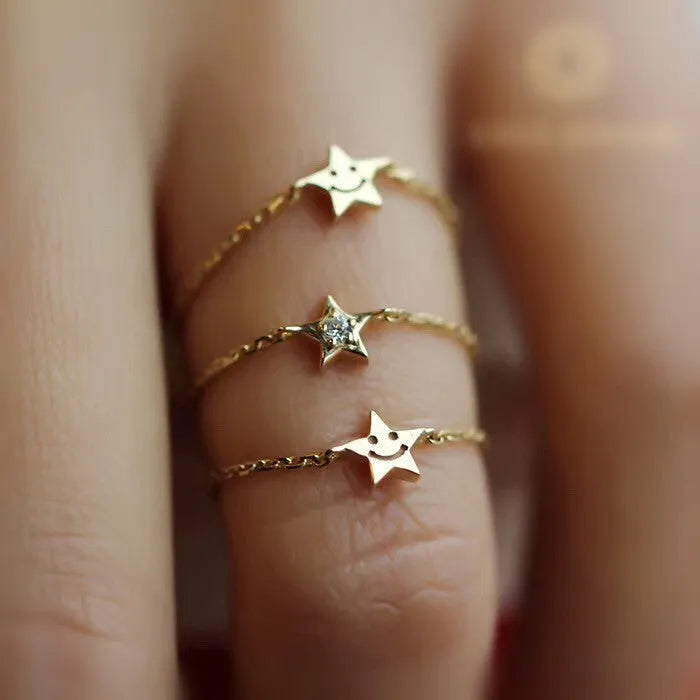 18K yellow gold adjustable star ring with two diamonds on hand, women's light luxury design