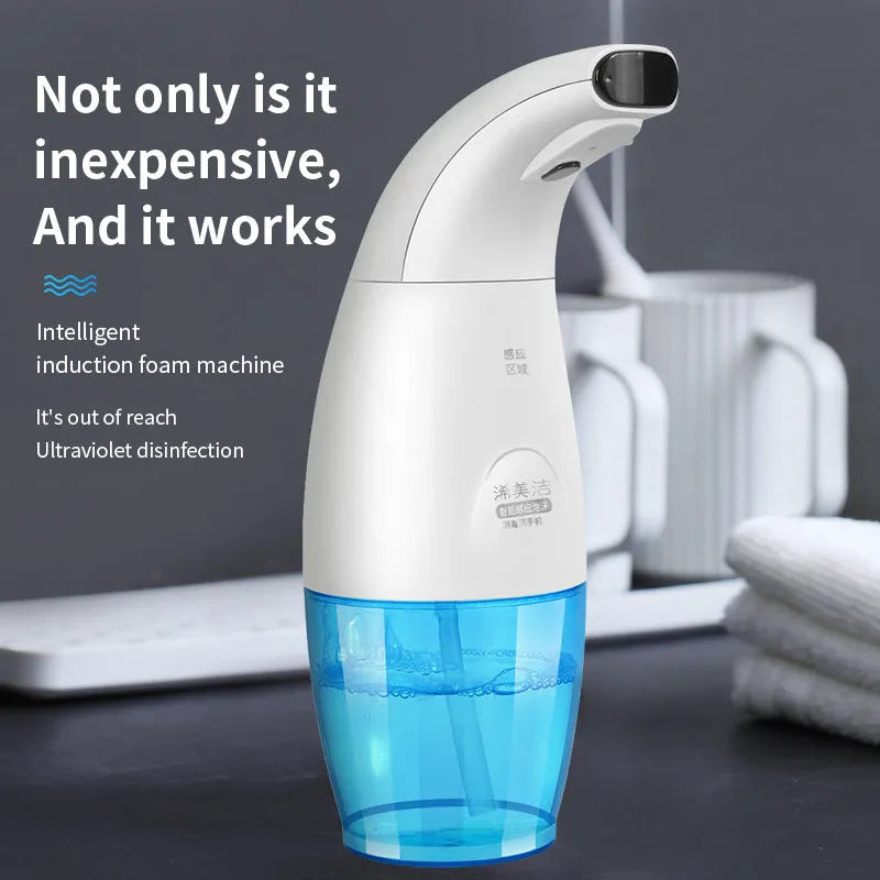 White intelligent induction foam machine on countertop with hand under nozzle dispensing foam
