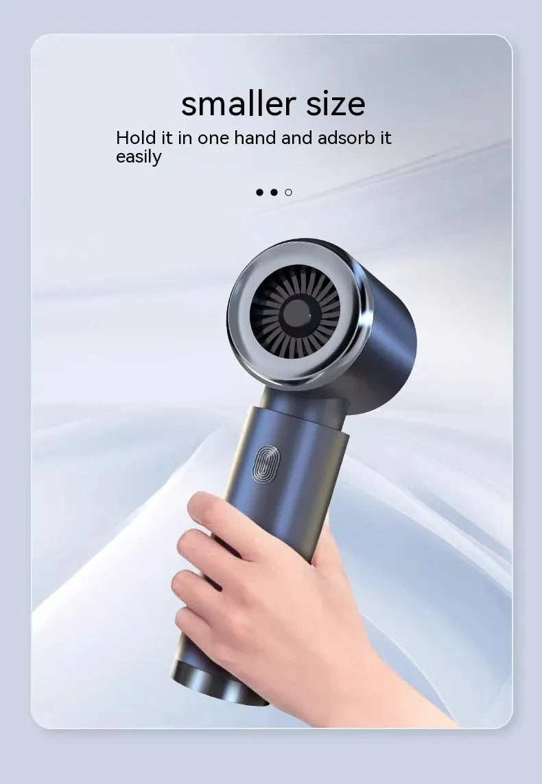 Space grey handheld car vacuum cleaner with cordless design and dual blowing/suction functions