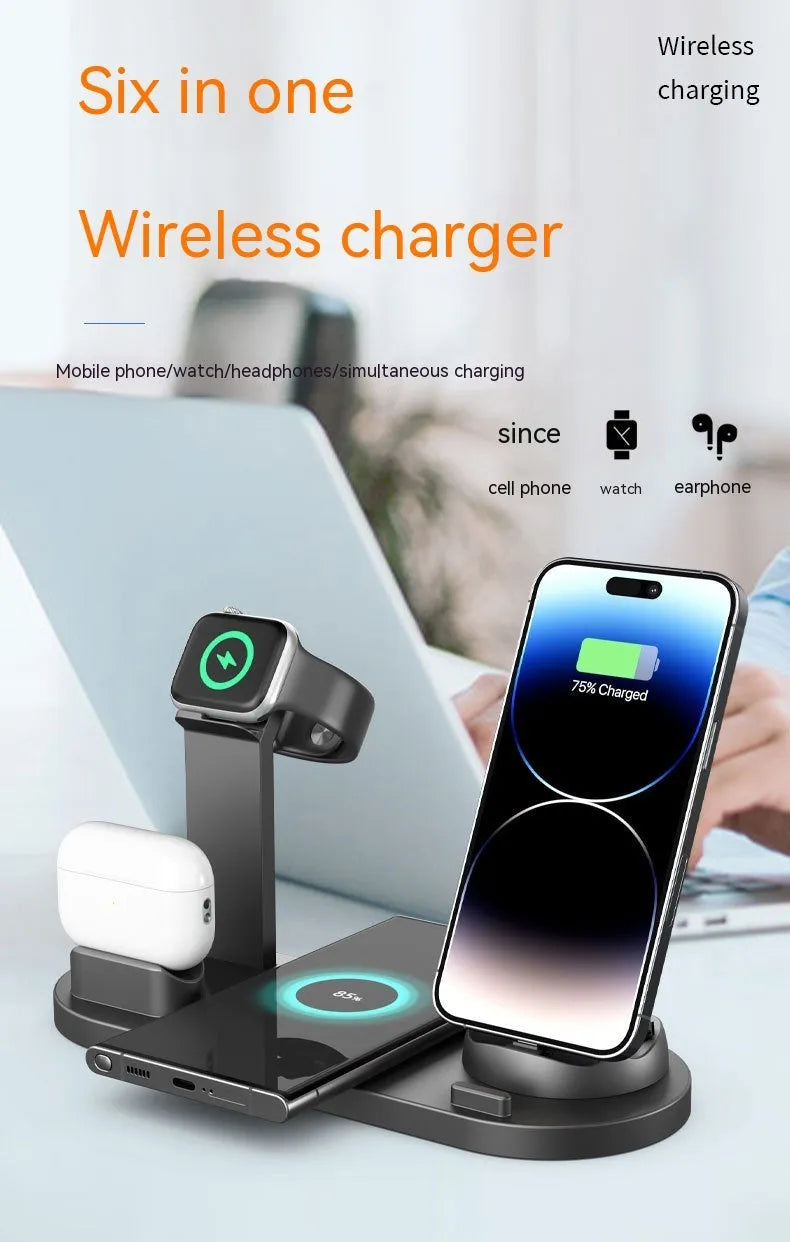 Black three-in-one wireless charger and phone holder on a desk showing iPhone charging.