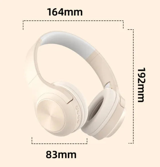 Over-ear wireless Bluetooth headset in Ivory White with a matching charging case on a table.