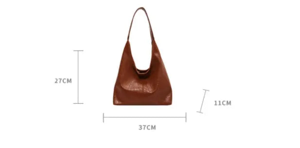 Soft PU leather large capacity shoulder bag in multiple colours with front sandwich pocket.